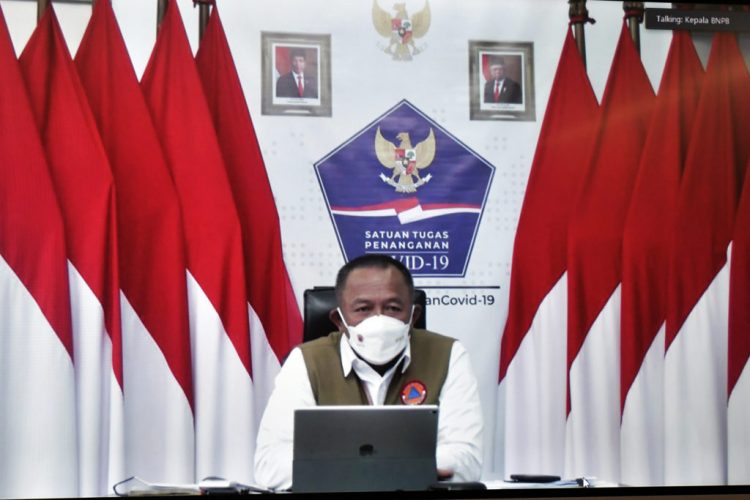 Kepala BNPB sekaligus Ketua Satgas Penanganan COVID-19 Ganip Warsito saat memberikan keterangan pers usai Rapat Terbatas mengenai Penanganan Pandemi COVID-19, secara virtual, Senin (21/06/2021).